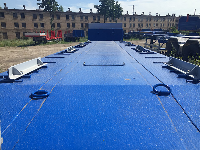 Низкорамный полуприцеп-тяжеловоз чмзап 93853 по спецификации 037 укв4 пп4