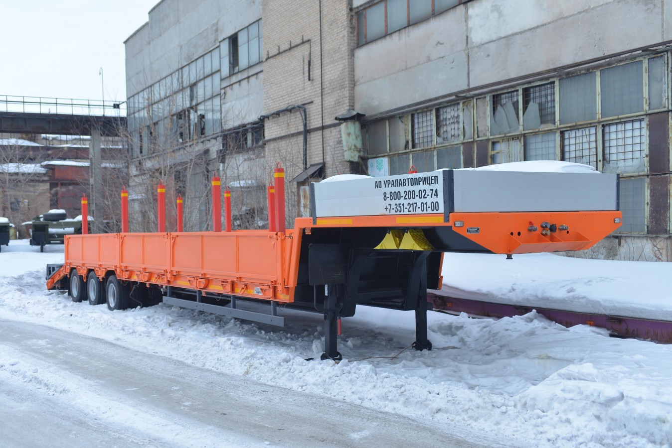 Низкорамный полуприцеп-тяжеловоз чмзап 99064 по спецификации 042-02 бут pw