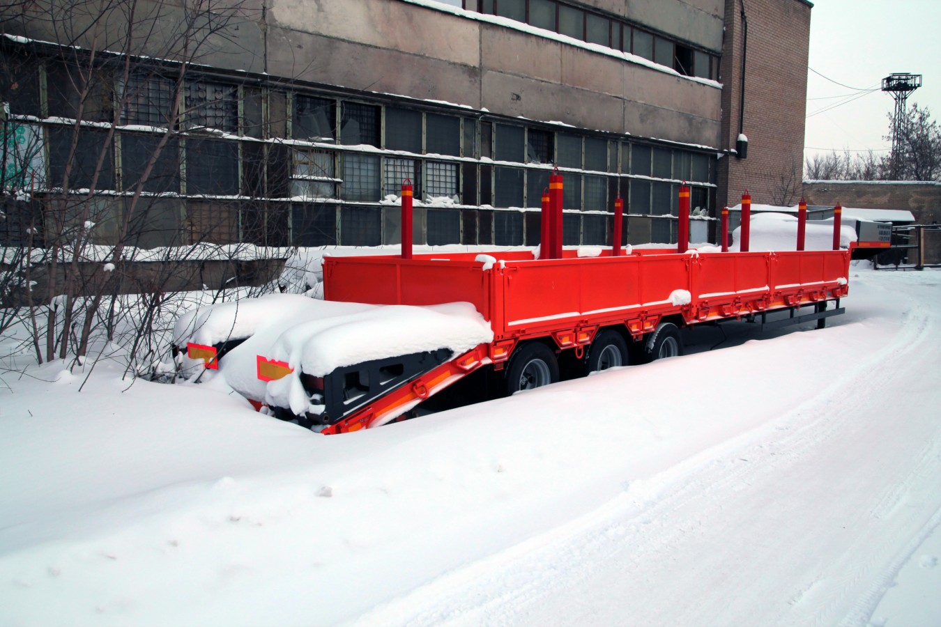 Низкорамный полуприцеп-тяжеловоз чмзап 99064 по спецификации 042-02 бут pw