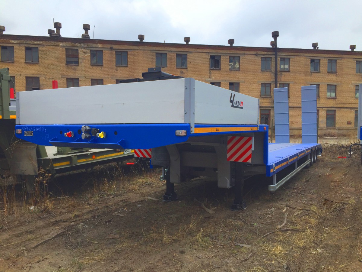 Низкорамный полуприцеп-тяжеловоз чмзап 99064 по спецификации 042-02 ву1
